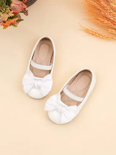 Zapatitos blanco con lazo